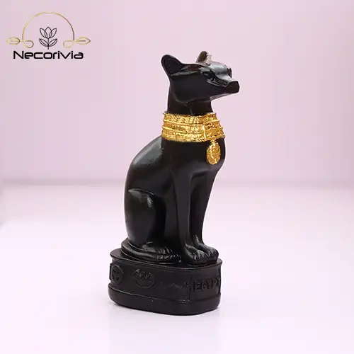 Black Egyptian cat-shaped candle with gold detailing, standing 13.5 cm tall and base width of 4.5 cm.