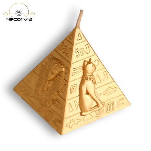 Gold pyramid-shaped candle with ancient Egyptian hieroglyphic designs.