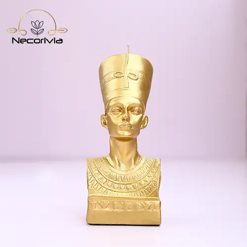 Gold Nefertiti candle bust featuring intricate Egyptian details.