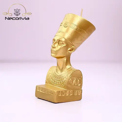 Gold Nefertiti candle bust featuring intricate Egyptian details.