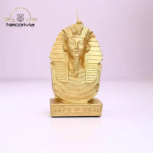 Gold candle bust of Tutankhamun featuring detailed ancient Egyptian craftsmanship.